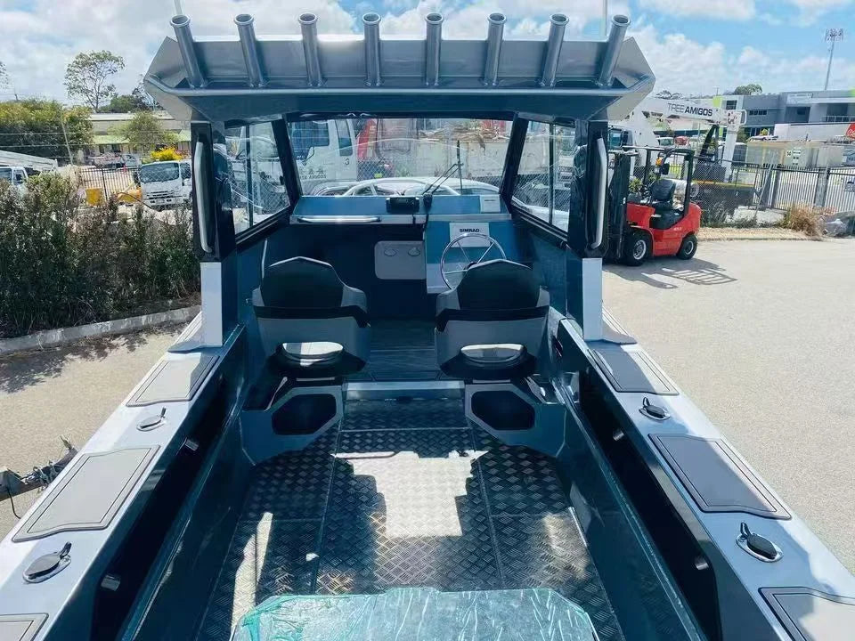 Reference boat cockpit showing side storage, seating, hardtop and rod holders