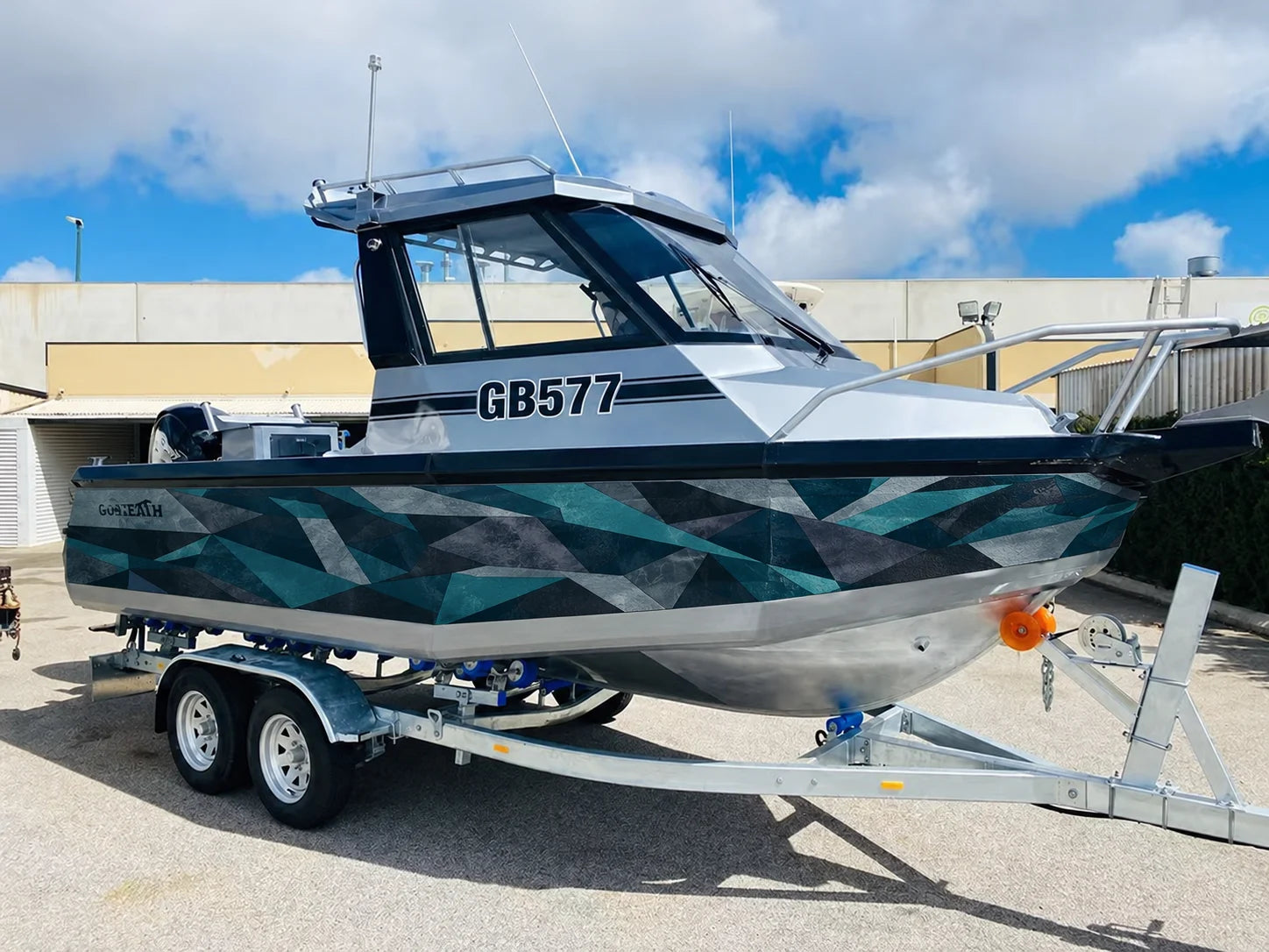 Geometric marine camouflage concept on the reference boat